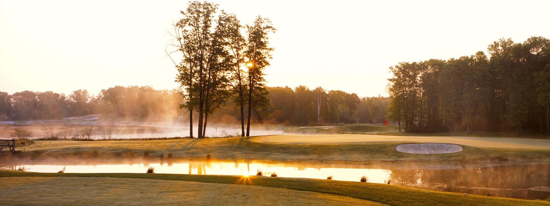 Picturesque golf course by lake stages Winter Classic