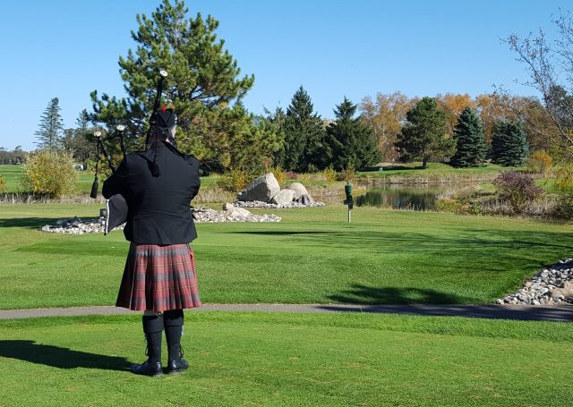 Rearview of a bagpiper